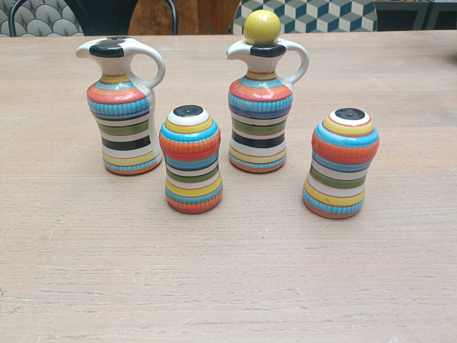 Vinegar and oil set, salt shaker and pepper shaker.