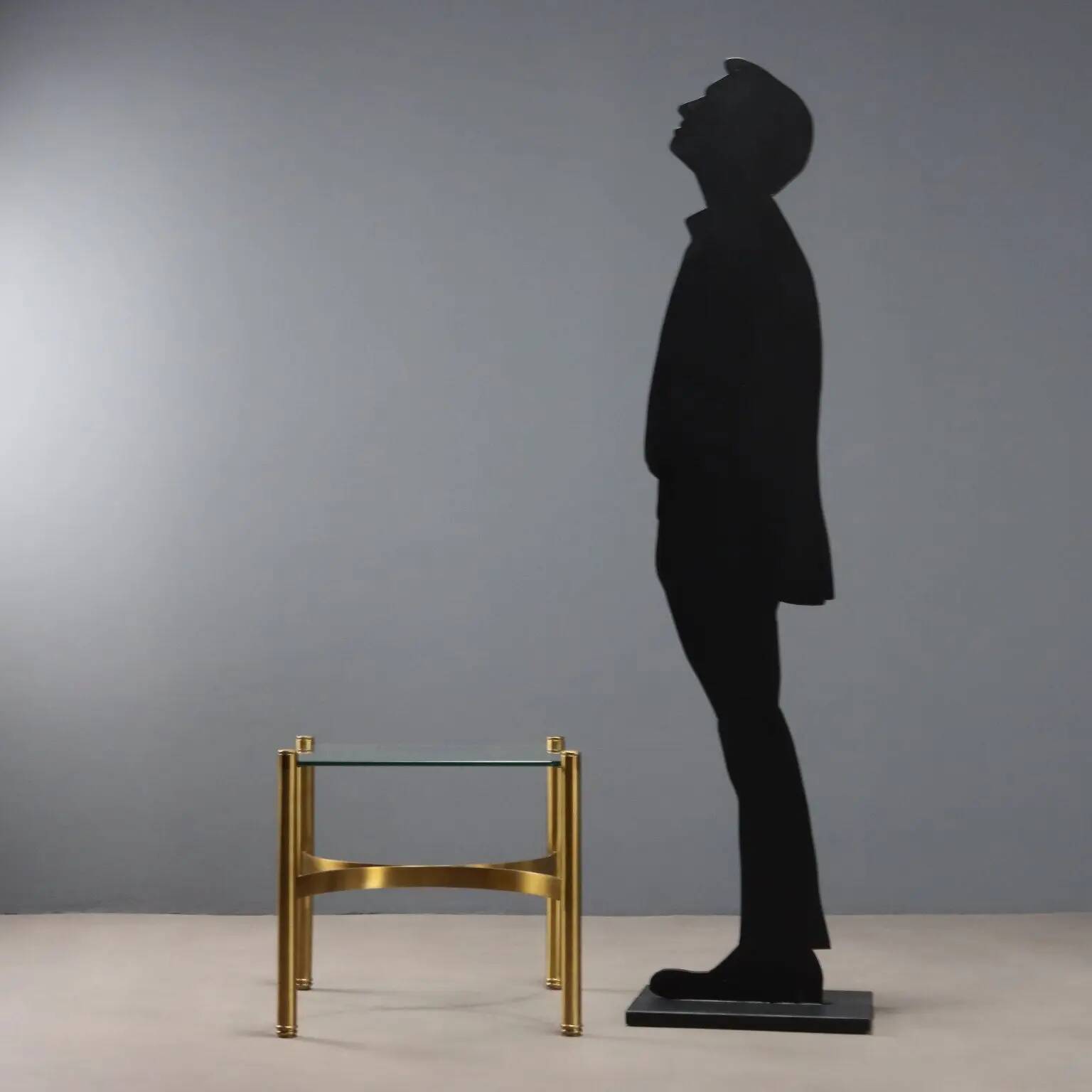 Vintage brass coffee table with glass top, Italian design from the 1970s.