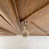 Storage unit in solid oak and veneer, circa 1960.
