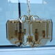 Golden chandelier 6 bevelled smoky glass lights