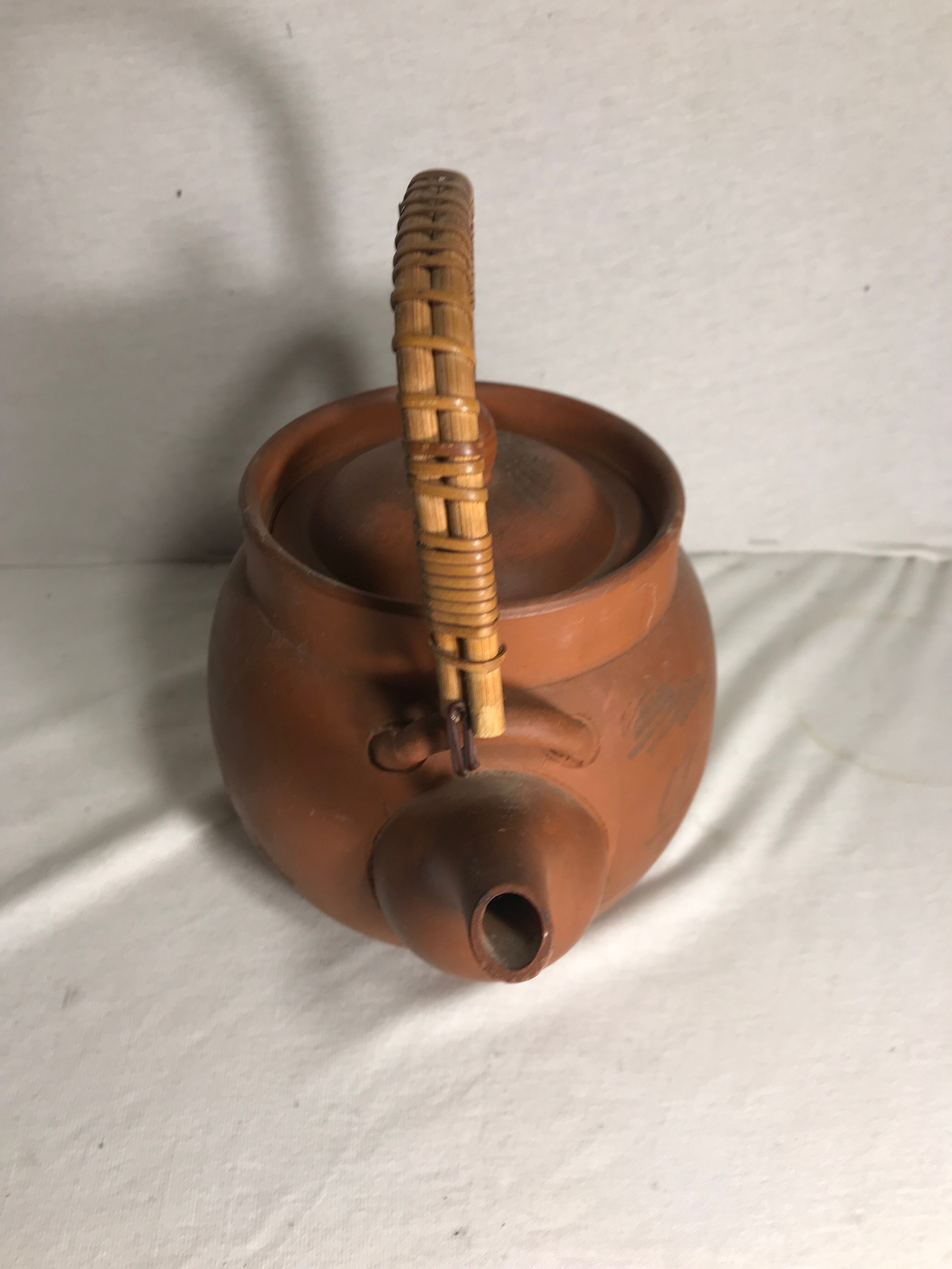 Antique terracotta teapot