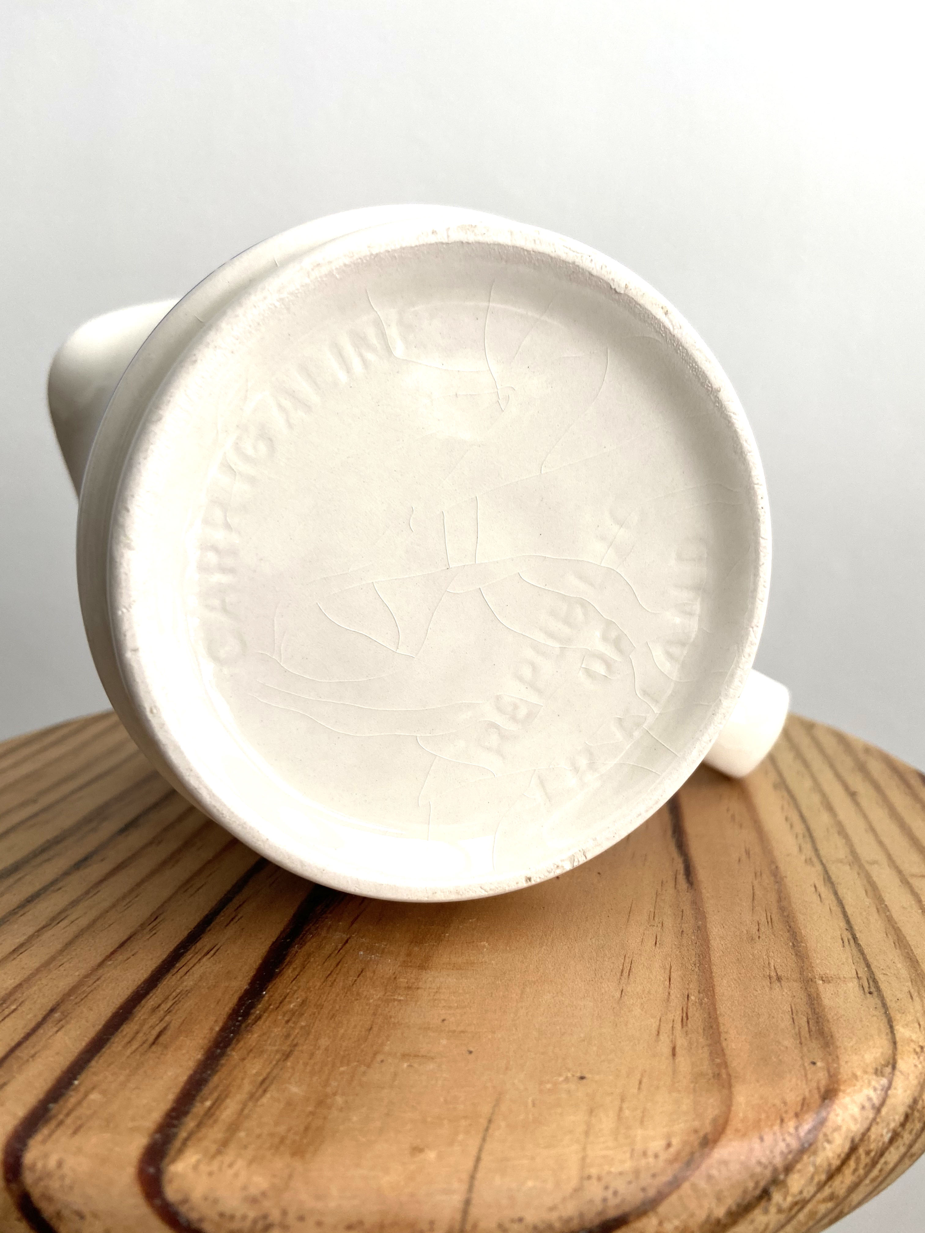 Striped earthenware pitcher