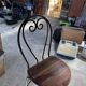 High chairs in rosewood and wrought iron