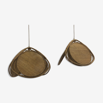 A pair of rattan and mulching suspensions