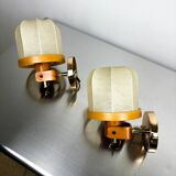 Pair of articulated "Cocoon" wall lights, resin and pine, Italy, 1970s