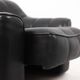 Maison De Sede. Armchair and its ottoman in black leather. 1970s.