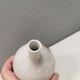 A vase in crackled porcelain with pink decoration. Germany 1930s