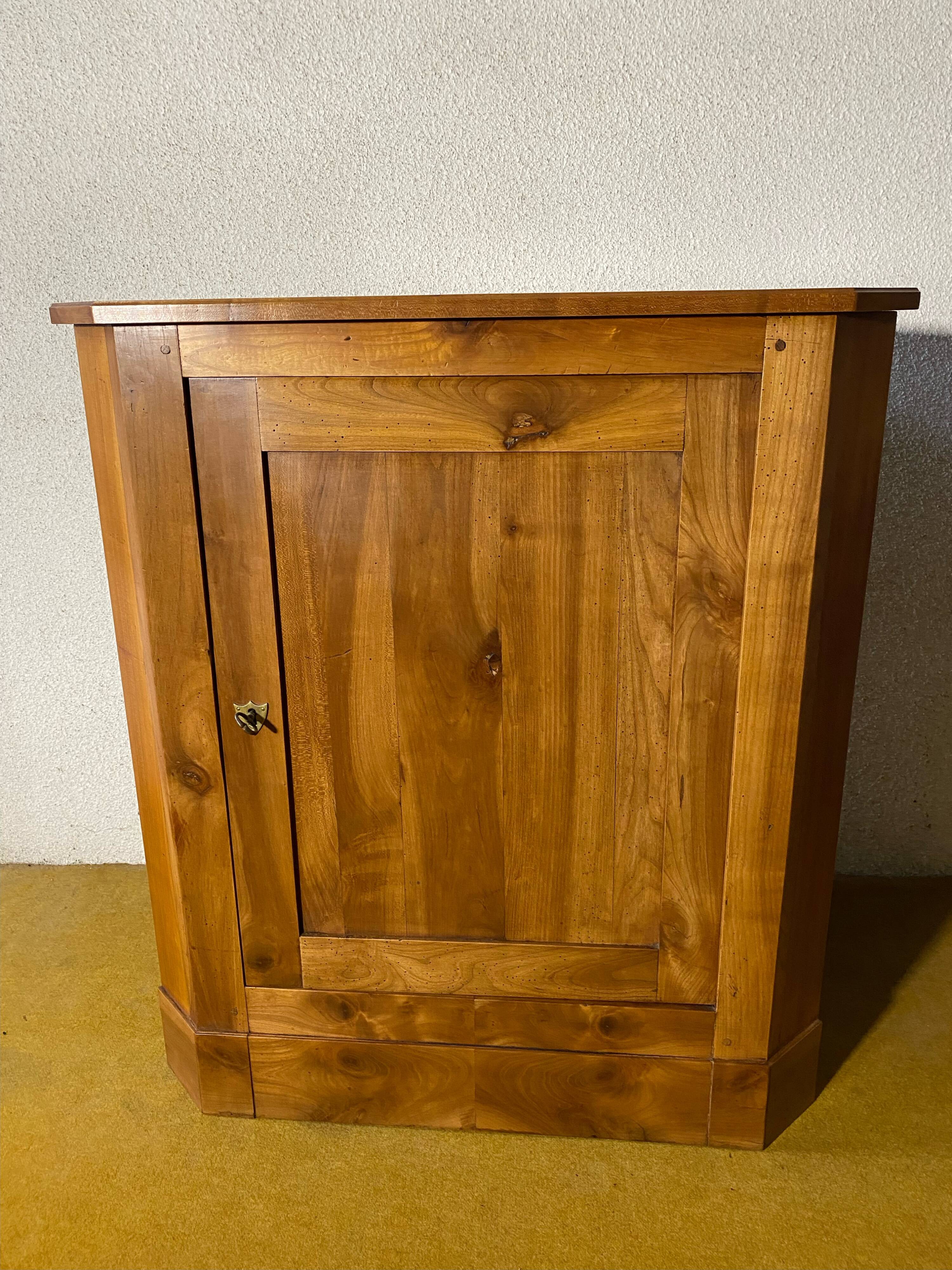 Cherry wood corner cupboard.