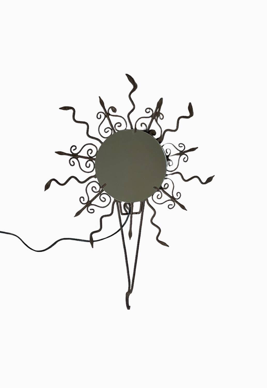 Luminous wrought iron sun mirror