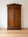 Armoire ancienne en noyer massif deux portes