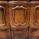 Louis XV style crossbow chest of drawers stamped in solid cherry wood