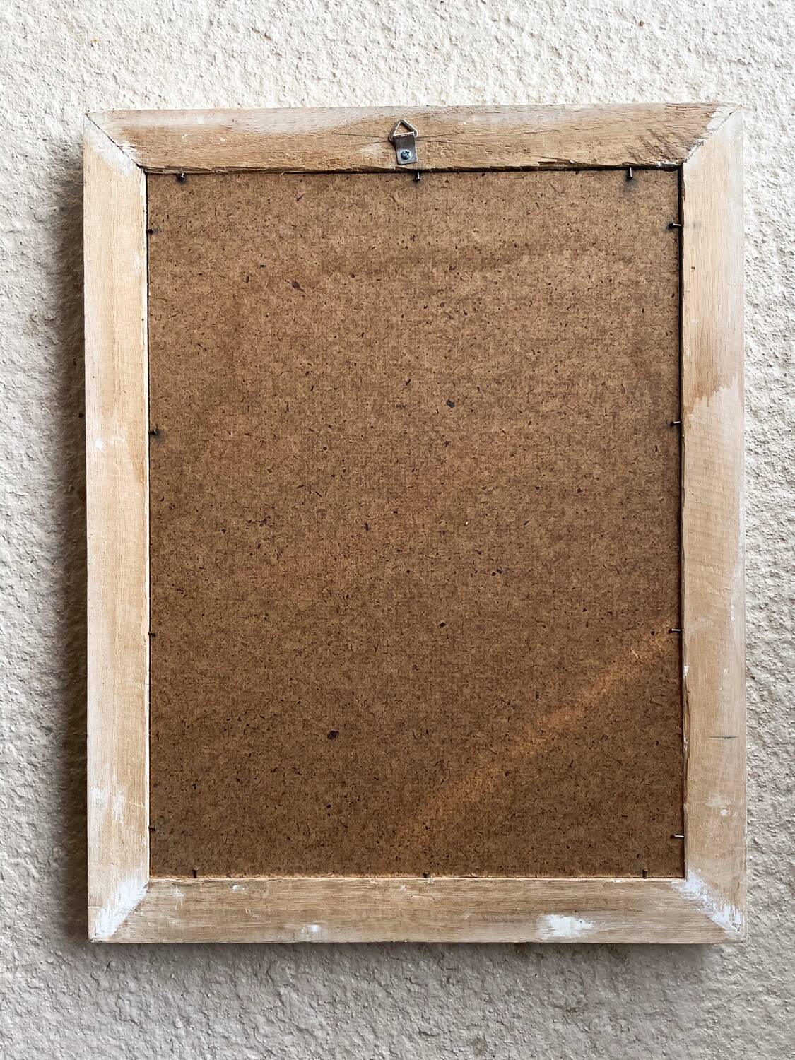 Beveled mirror in carved wood