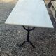 Bistro table top marble foot cast iron