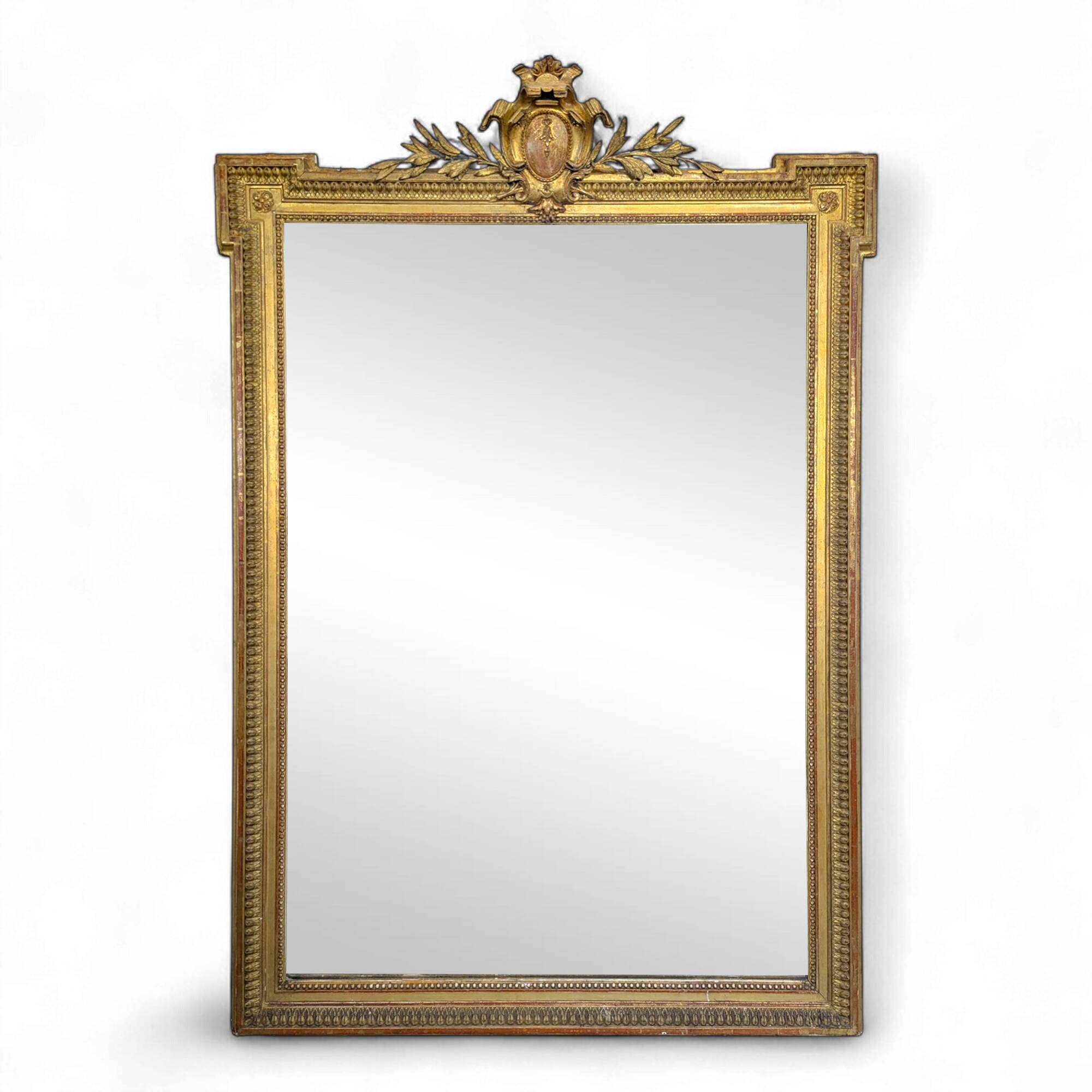 Large stucco and gilded wood mirror from the Napoléon III period.