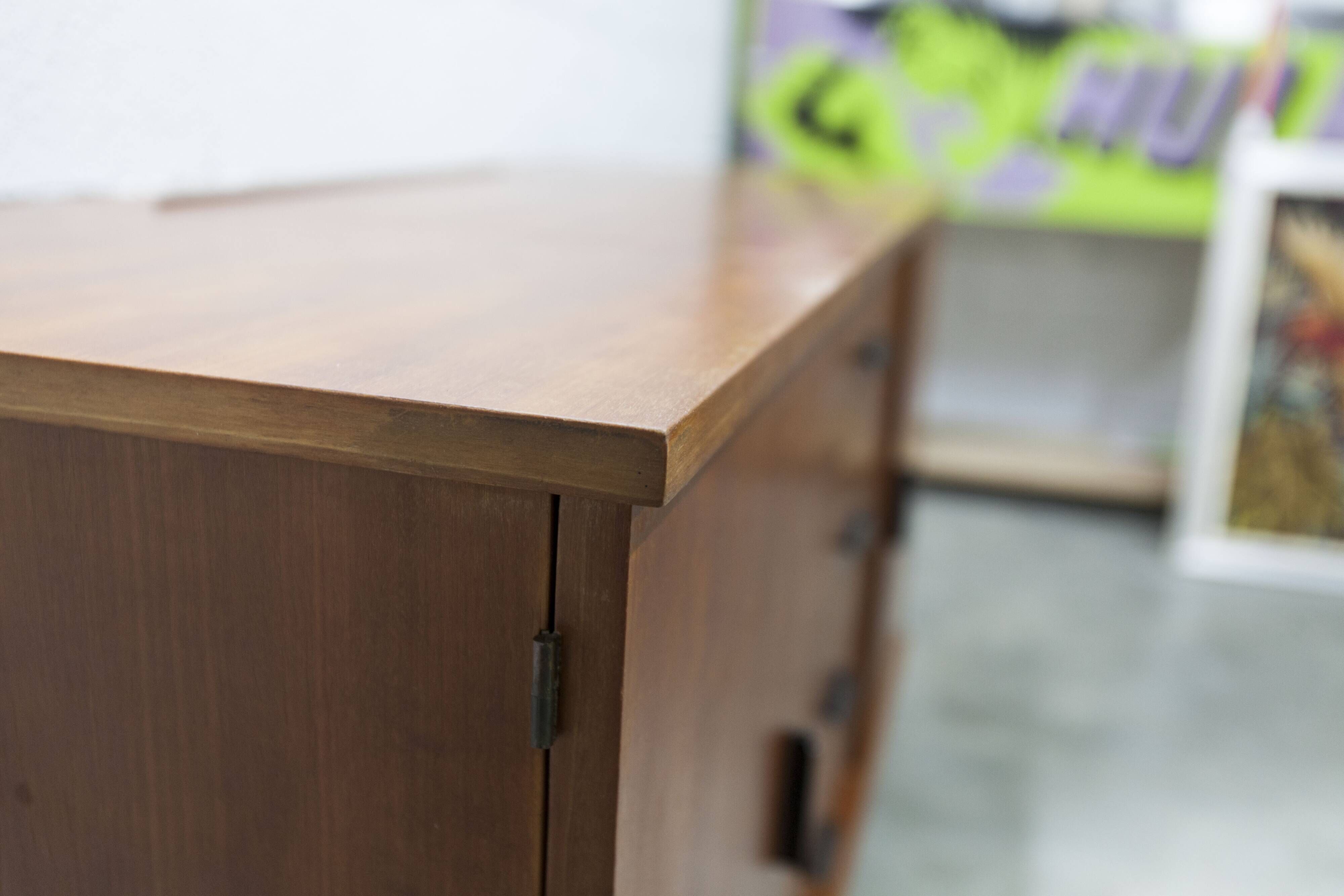 1960s teak sideboard with 4 drawers, 2 doors, and a mirror.