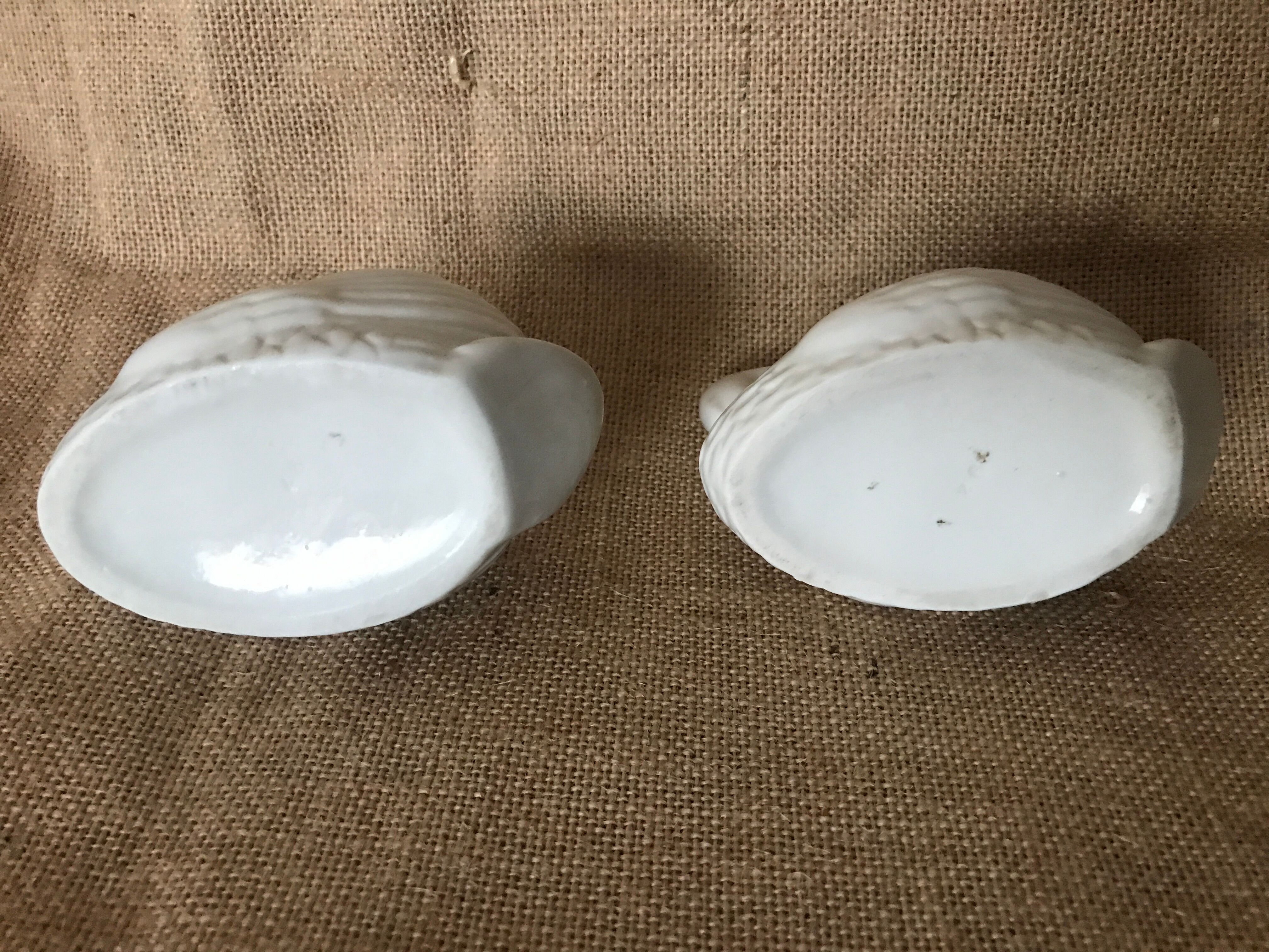 Pair of pots in swan-shaped earthenware