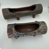 Lot of sandstone planter in the shape of logs