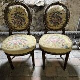 pretty pair of Louis XVI style chairs, in carved and gilded wood