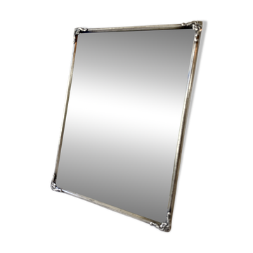 Ancien miroir encadré, verre biseauté et cadre en métal argenté, 1930-1940