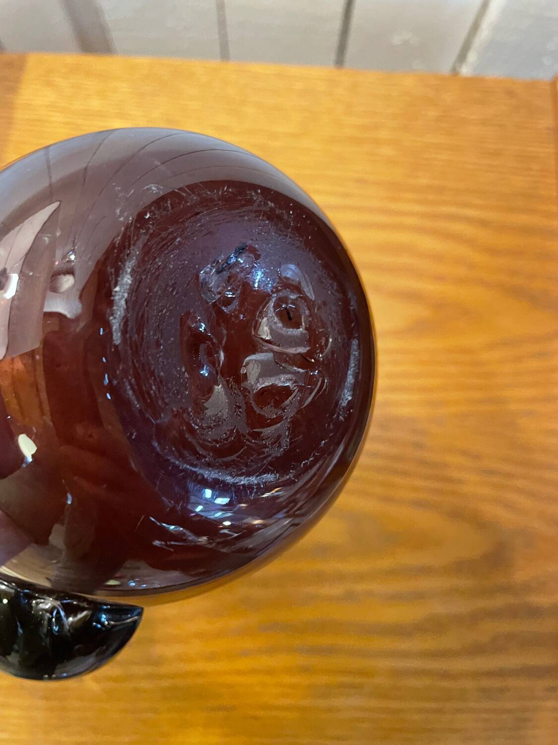 Plum colored glass pitcher