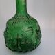 Empoli green glass bottle, zodiac signs
