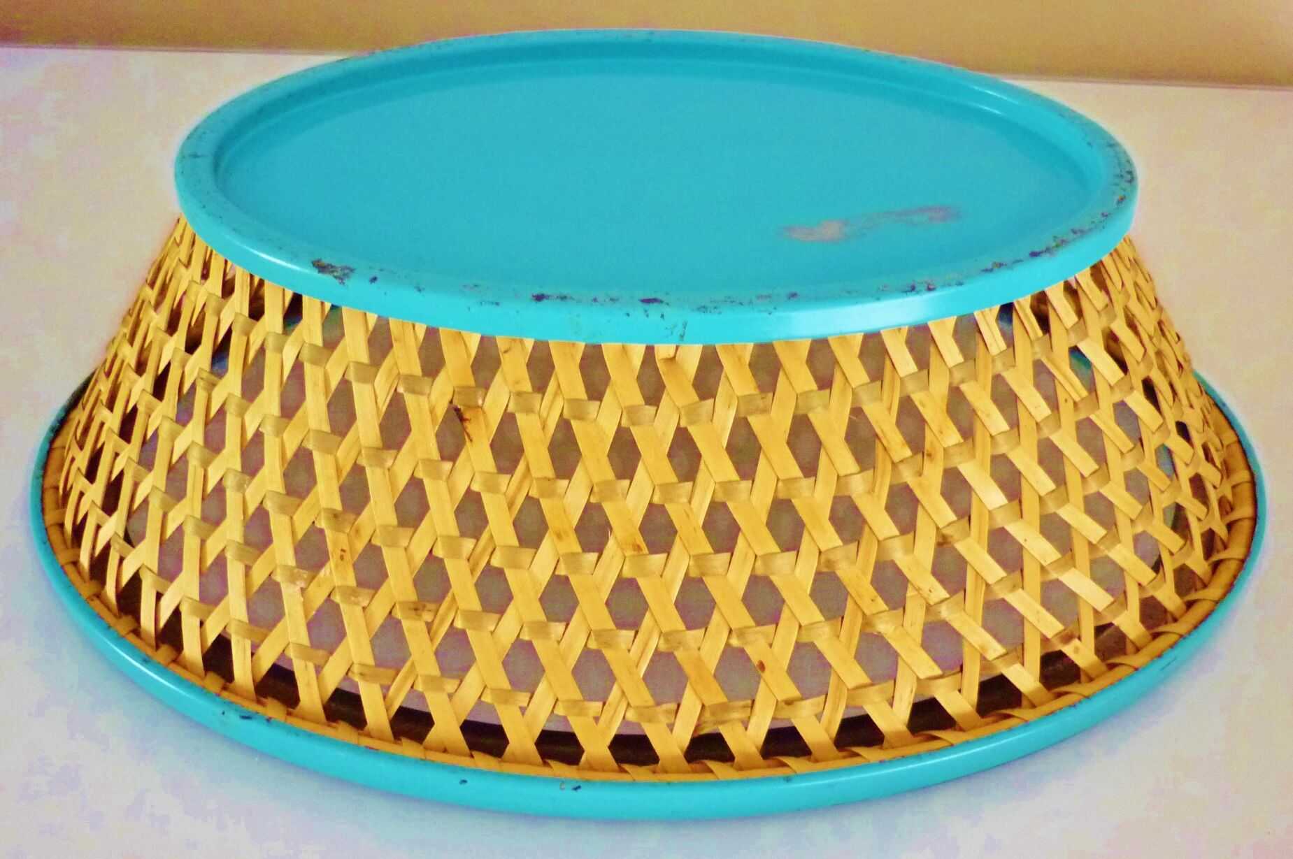 Antique basket in painted sheet metal and woven wicker, decorated with roses