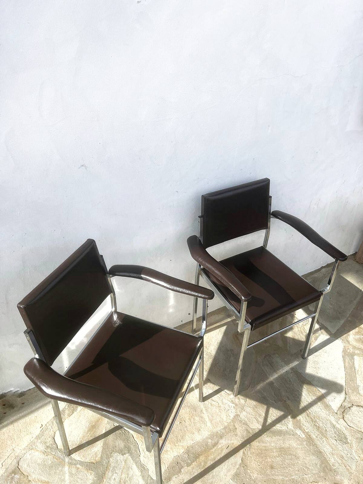 2 chrome designer chairs