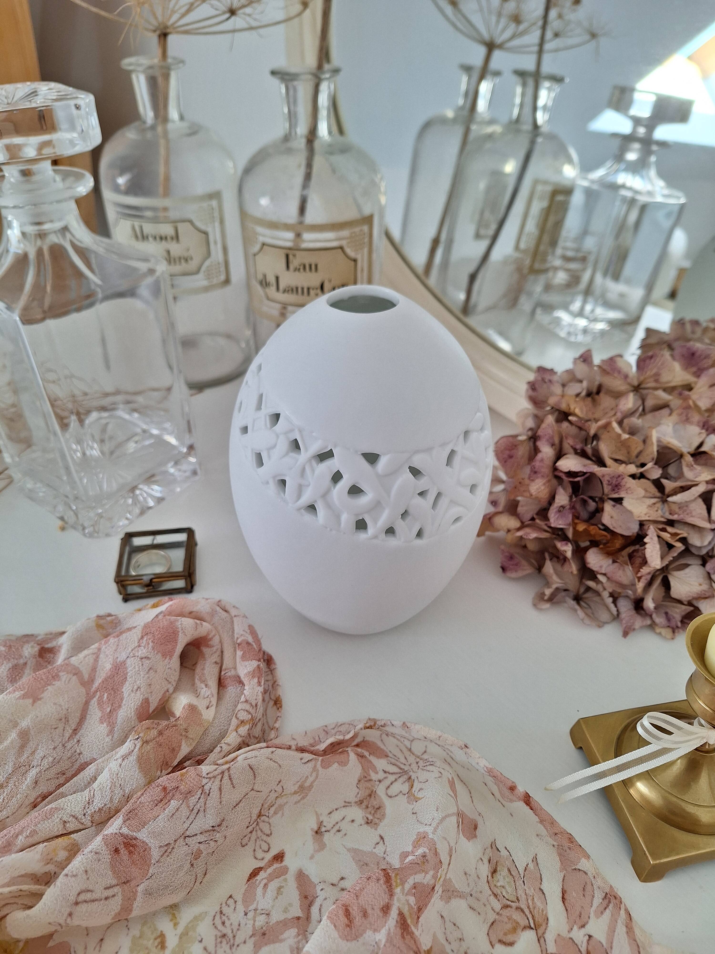 White porcelain egg vase
