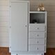 Asymmetrical cabinet