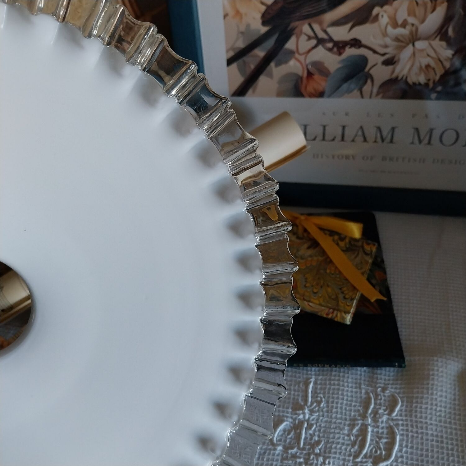 Old lace-edged conical lampshade in opaline