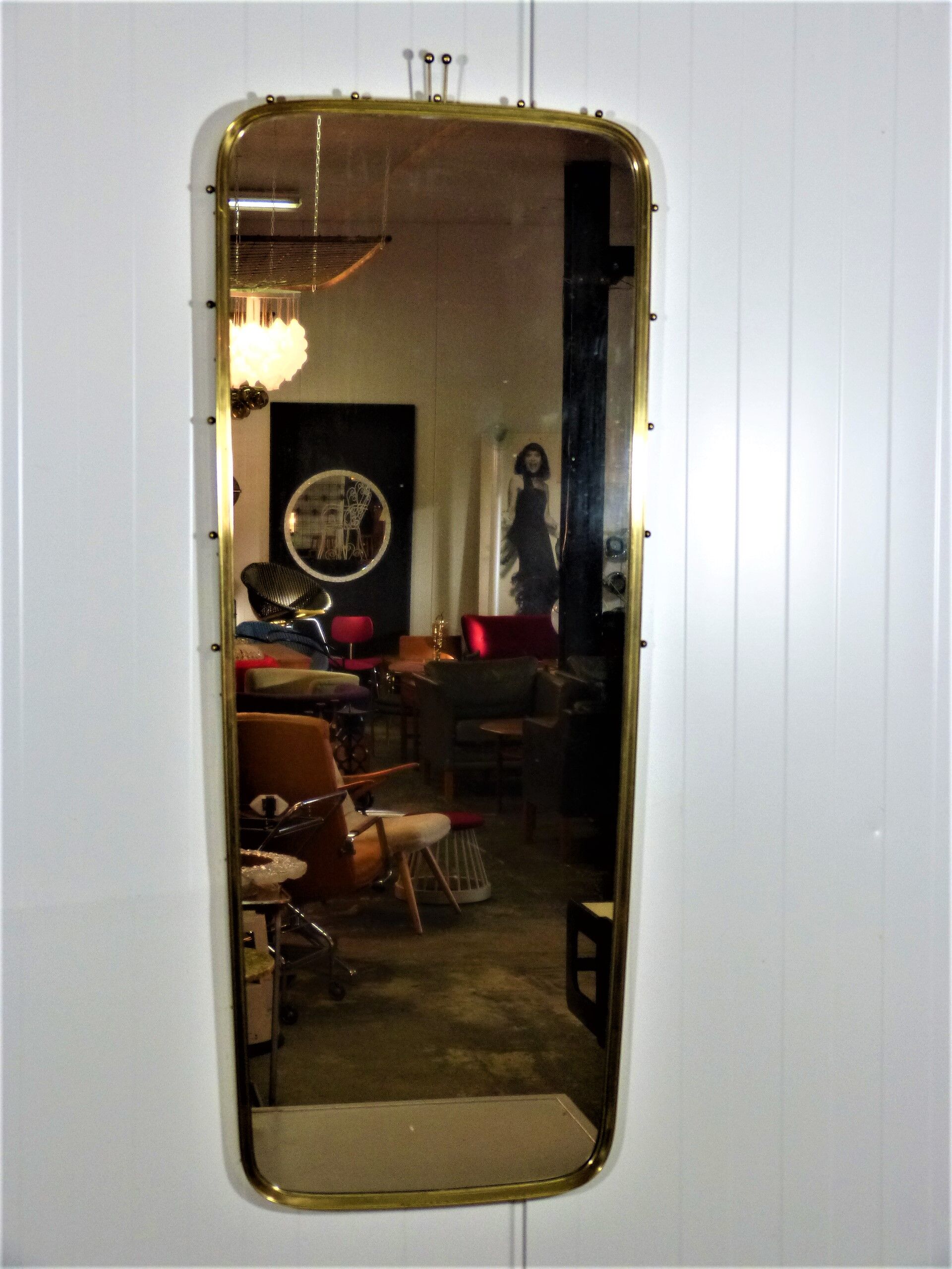 Brass wall mirror by "Münchener Zierspiegel", Germany