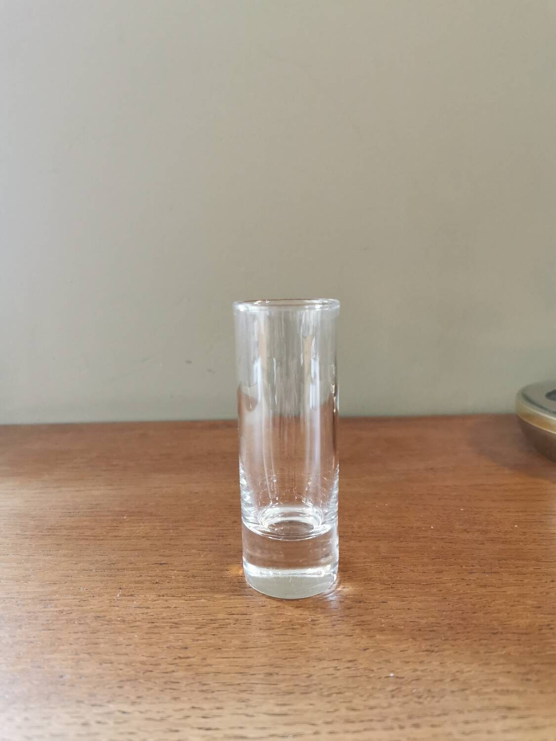 6 shot glasses on vintage metal support