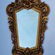 Antique wall mirror in carved gilded wood, Louis XV style, 19th century, 98 x 57 cm.