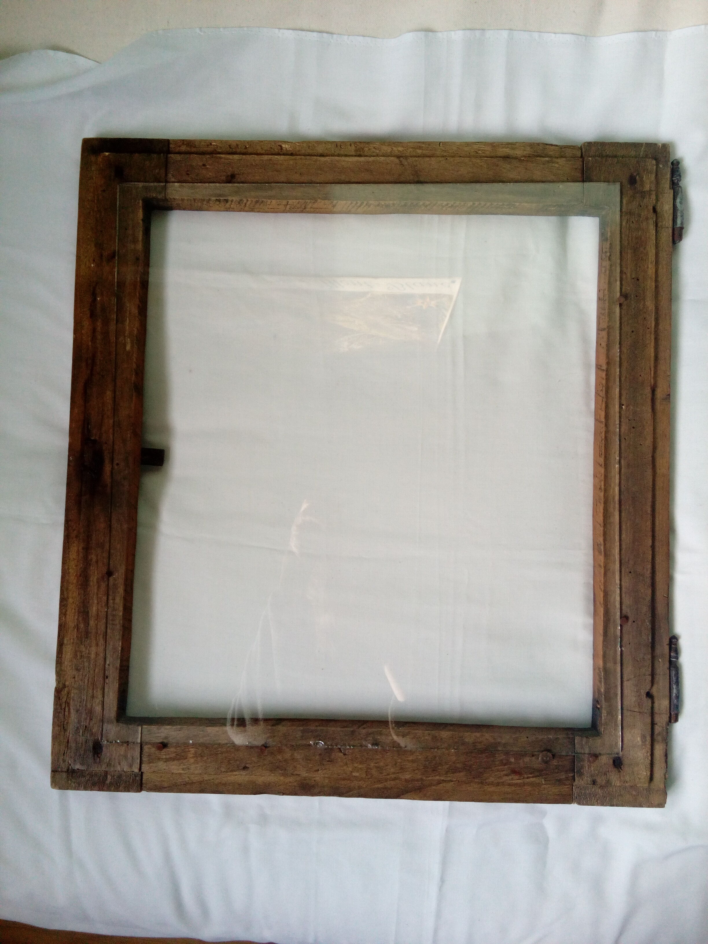 Wooden glass door with iron latch