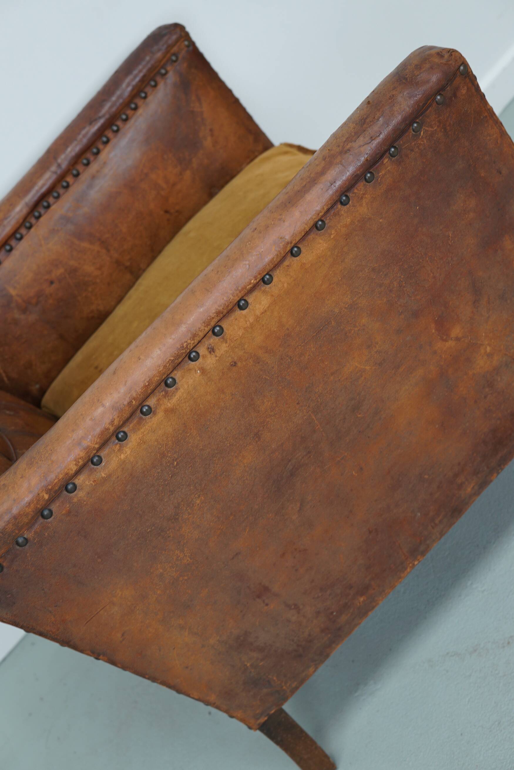 French cognac leather buttoned back club chair