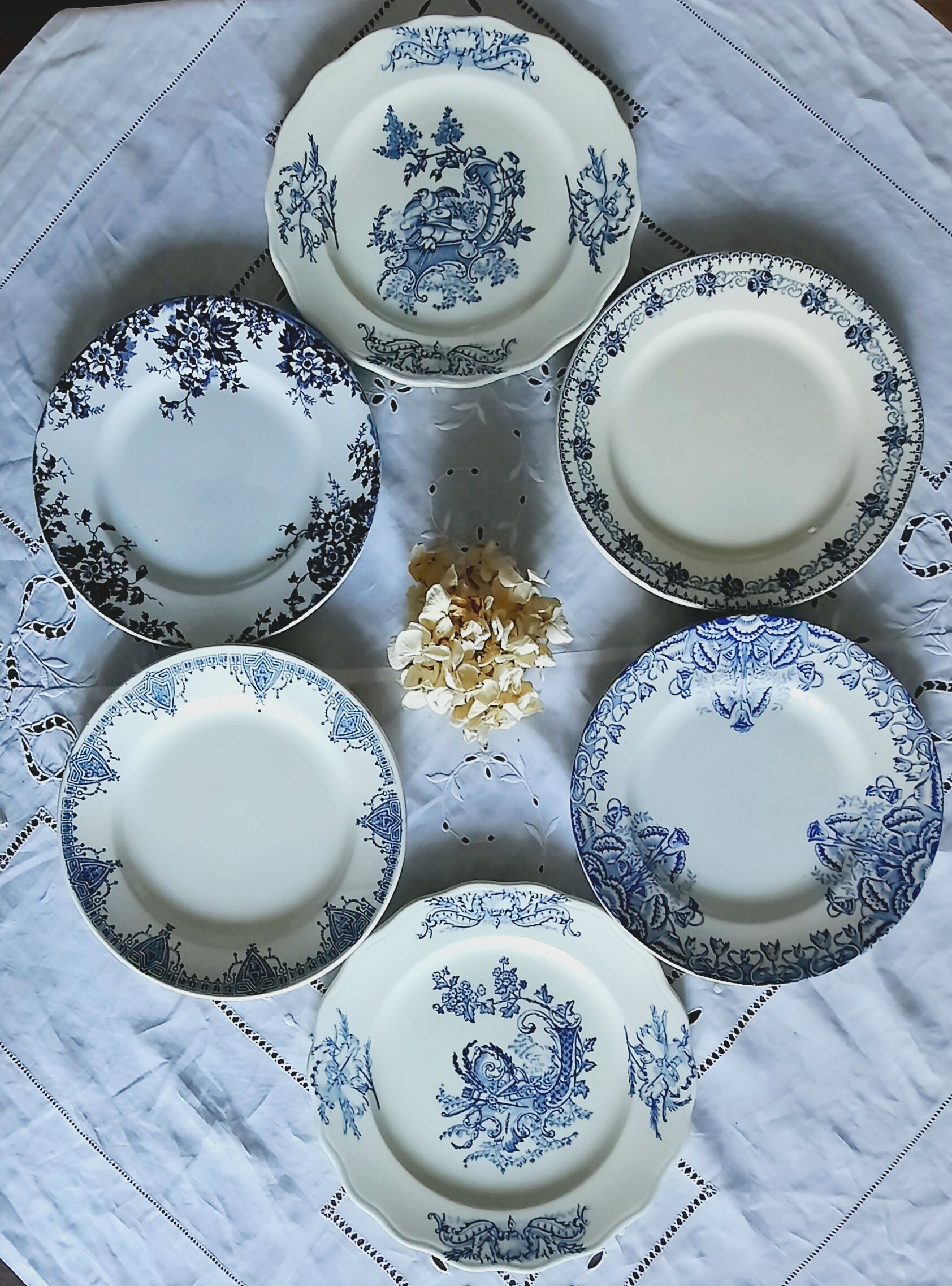 Old flat plates mismatched in earthenware