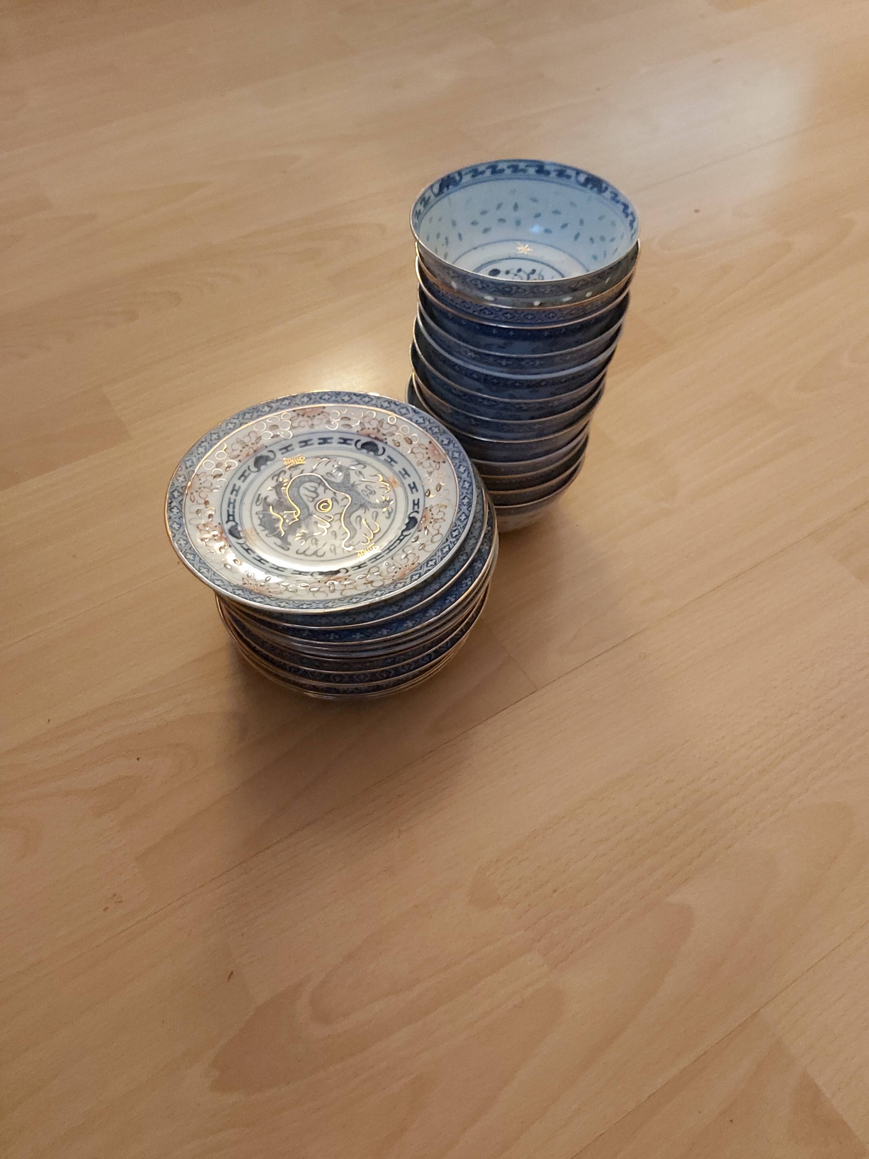 Service of 12 bowls and 12 under dishes in Chinese porcelain called rice seed of the 1960s