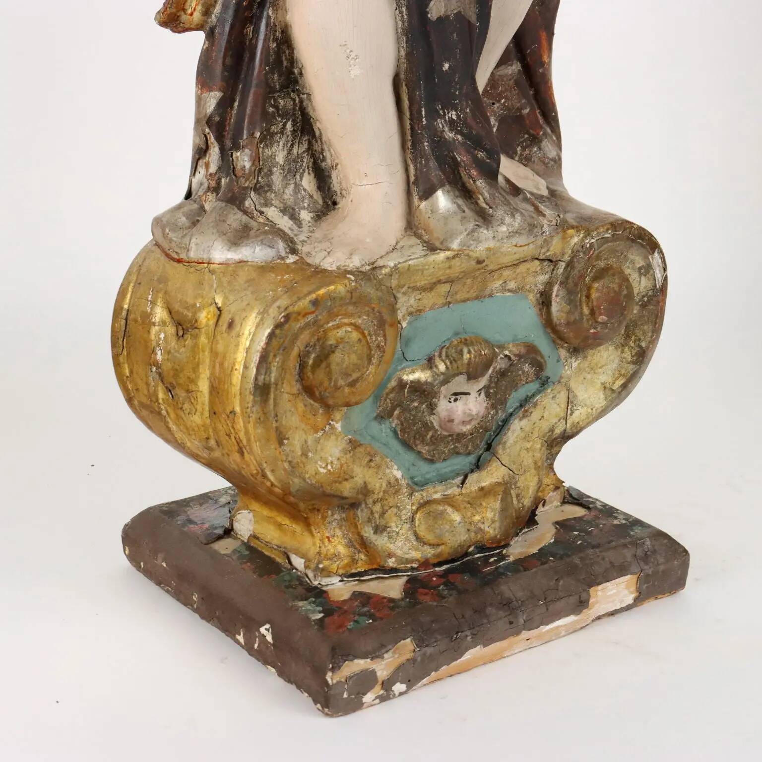 Antique wooden lacquered angel-shaped candlesticks, 18th century.