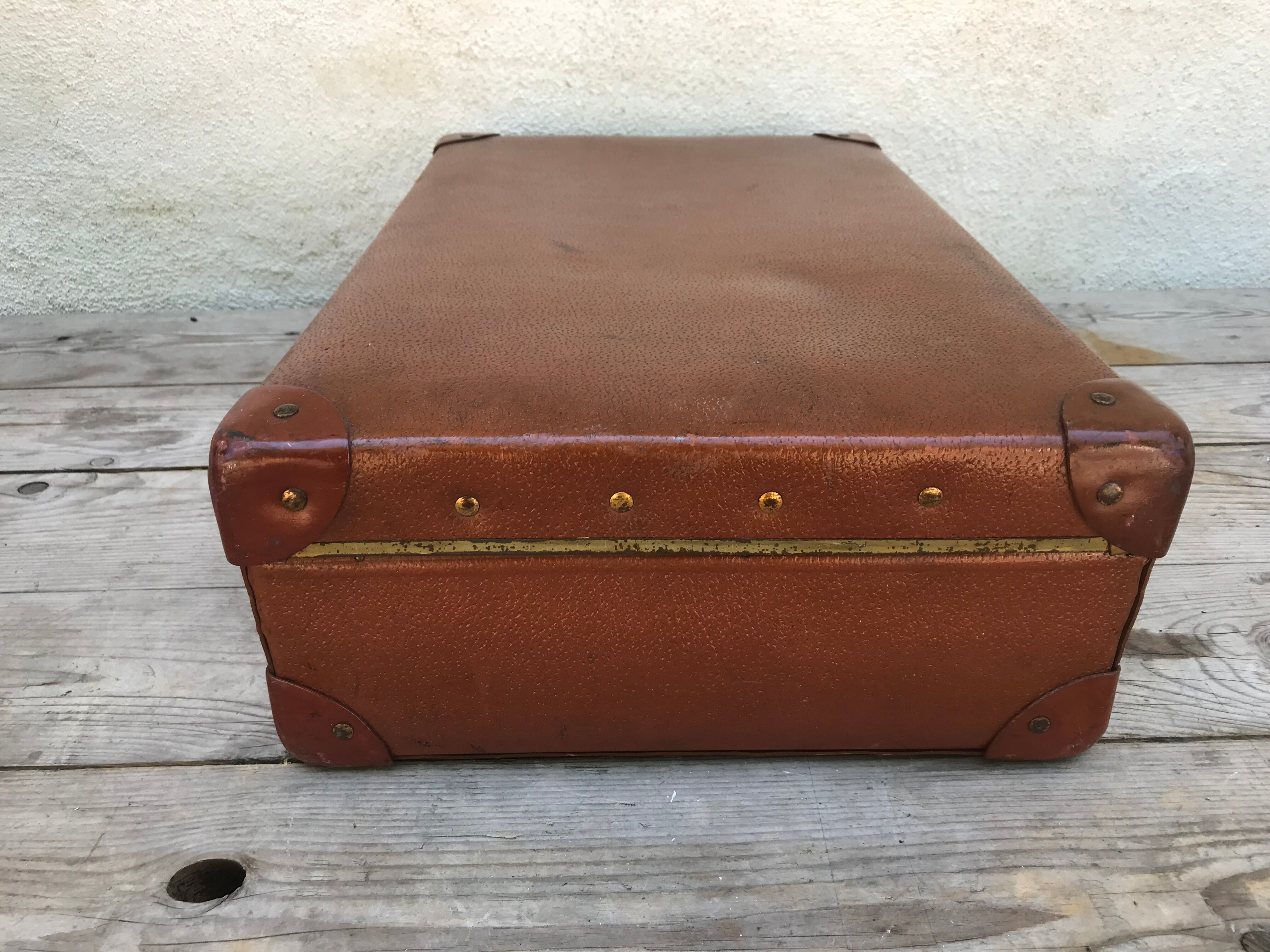 Old suitcase travel ultima brown fiber trunk