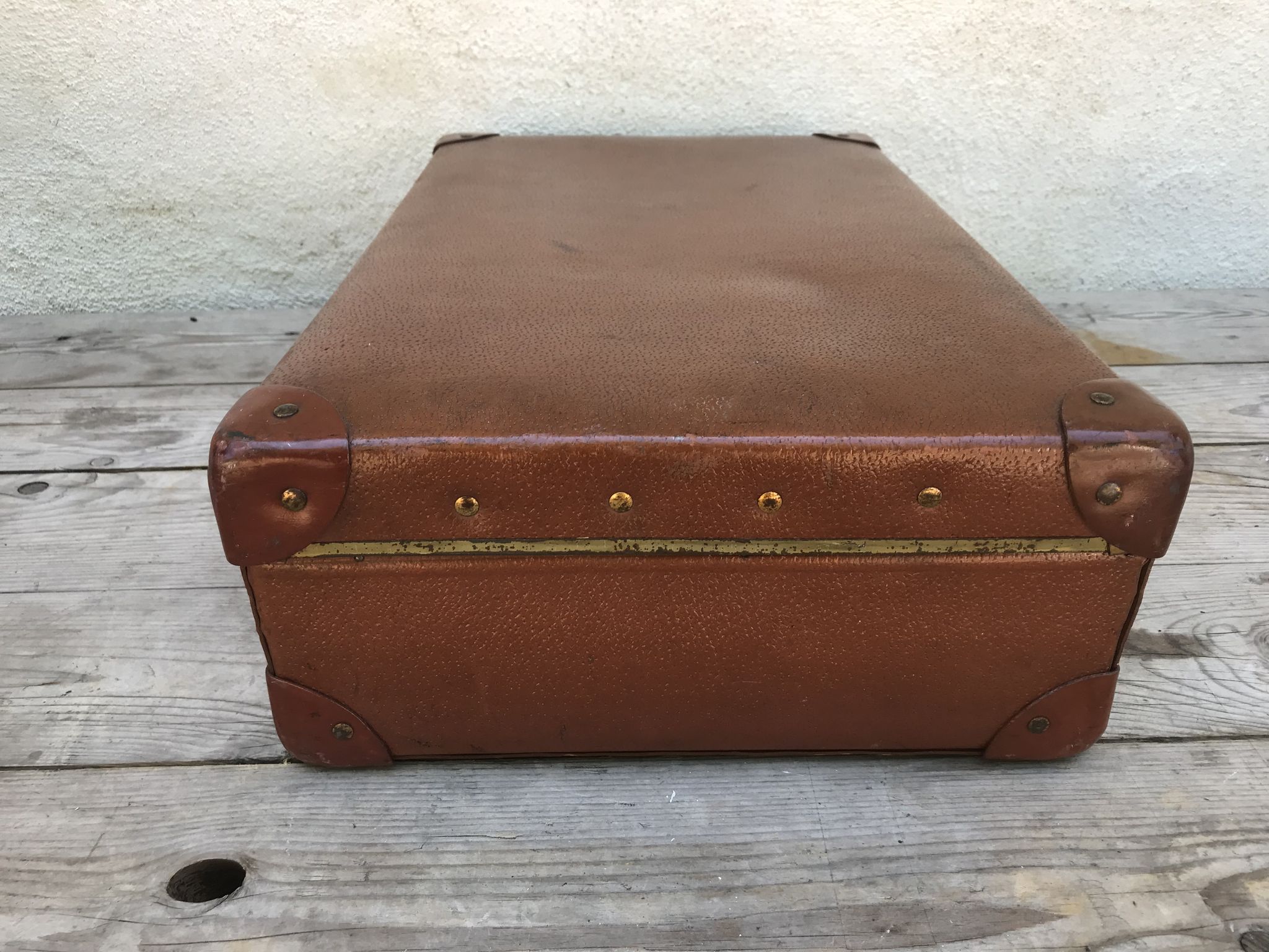Old suitcase travel ultima brown fiber trunk