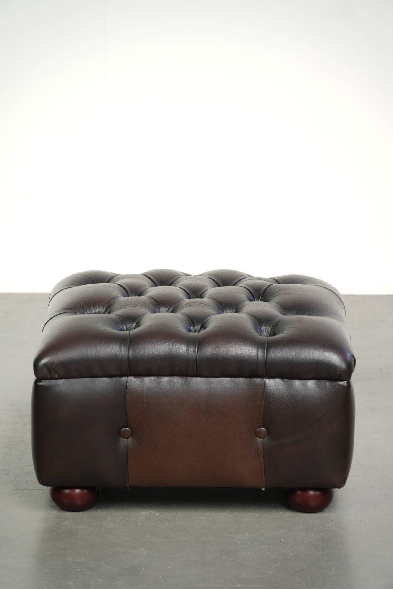 Cowhide Chesterfield ottoman with beautiful colours in English style