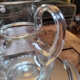 Engraved glass jug with floral decoration – 75 cl – mid 20th century