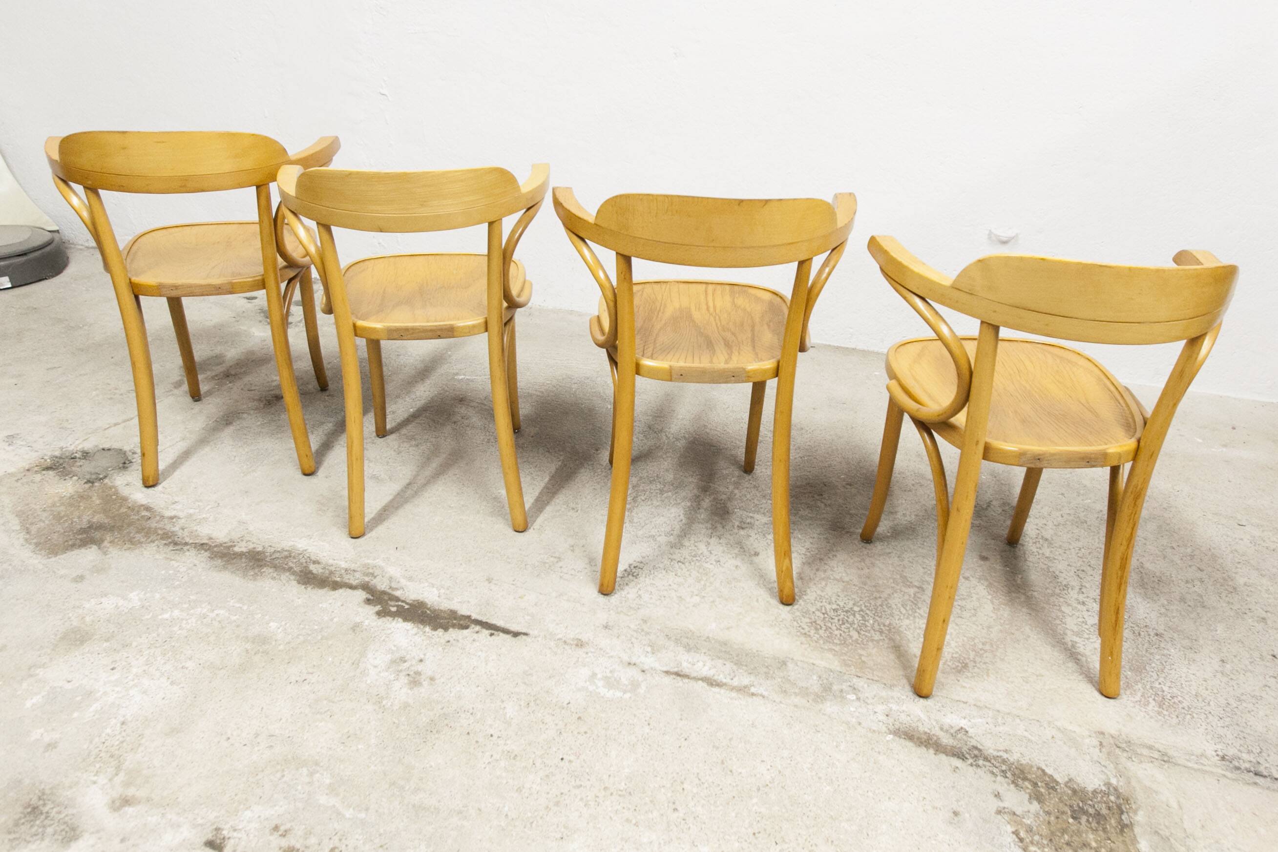 Set of 4 bistro armchairs with armrests from the 1960s.