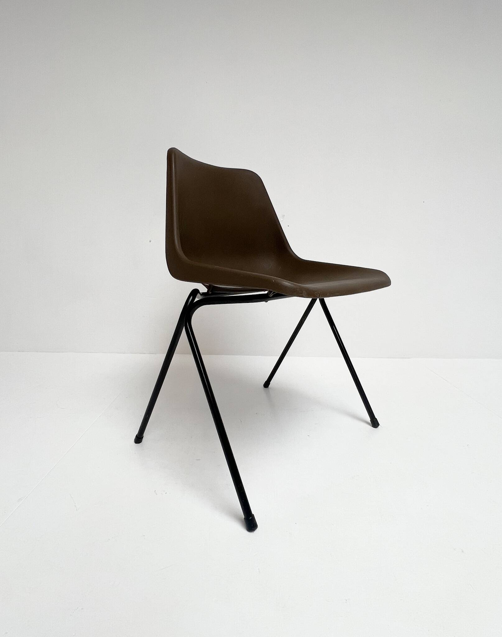 Brown and black set of 6 Polyprop chairs on a metal frame. The Polyprop cha