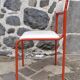 Tubular red metal chair, 70s