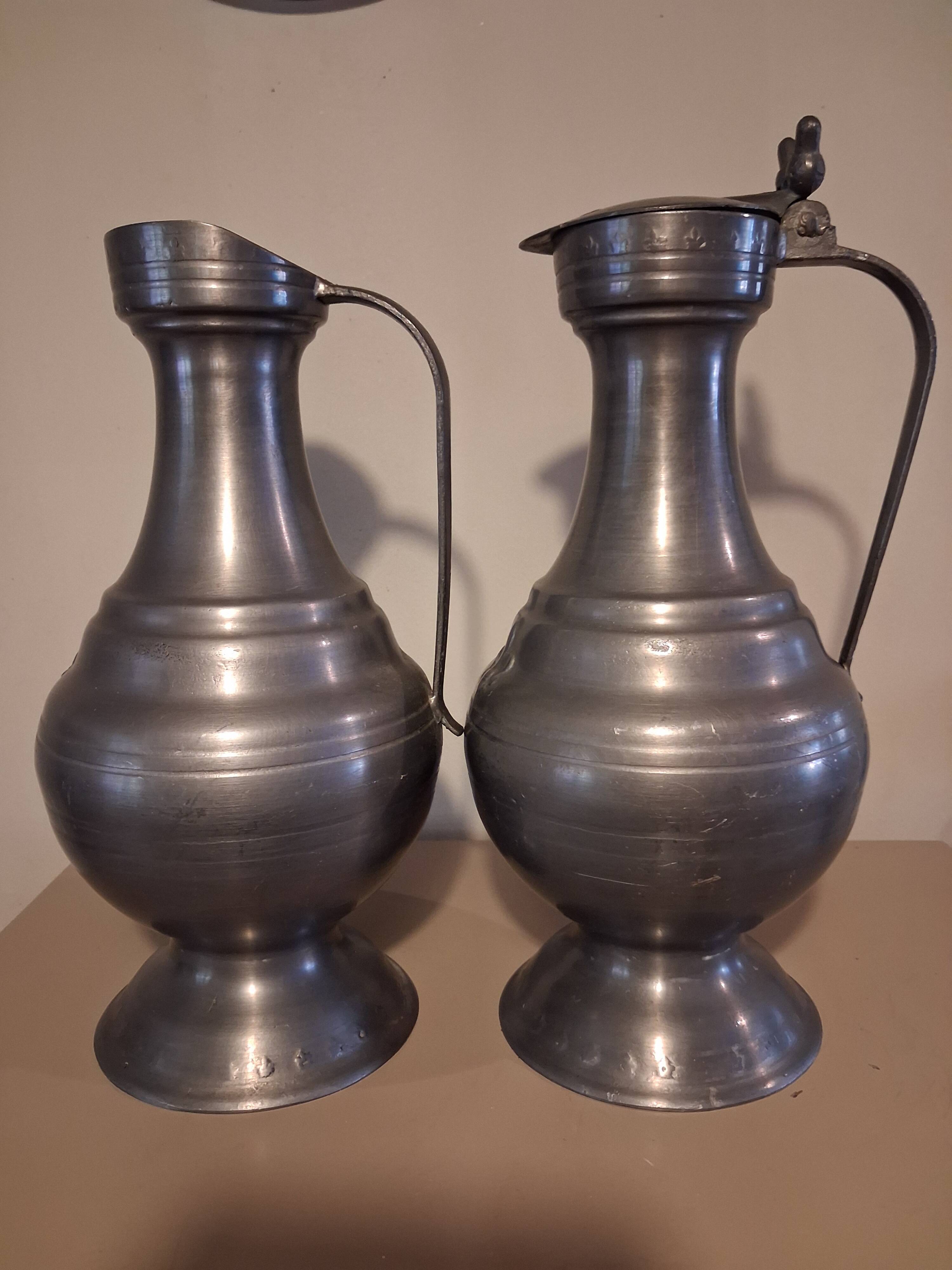Large vintage pewter jugs