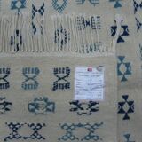 Nomadic Tunisian Berber rug, margoum kilim, ethnic in beige and blue wool.