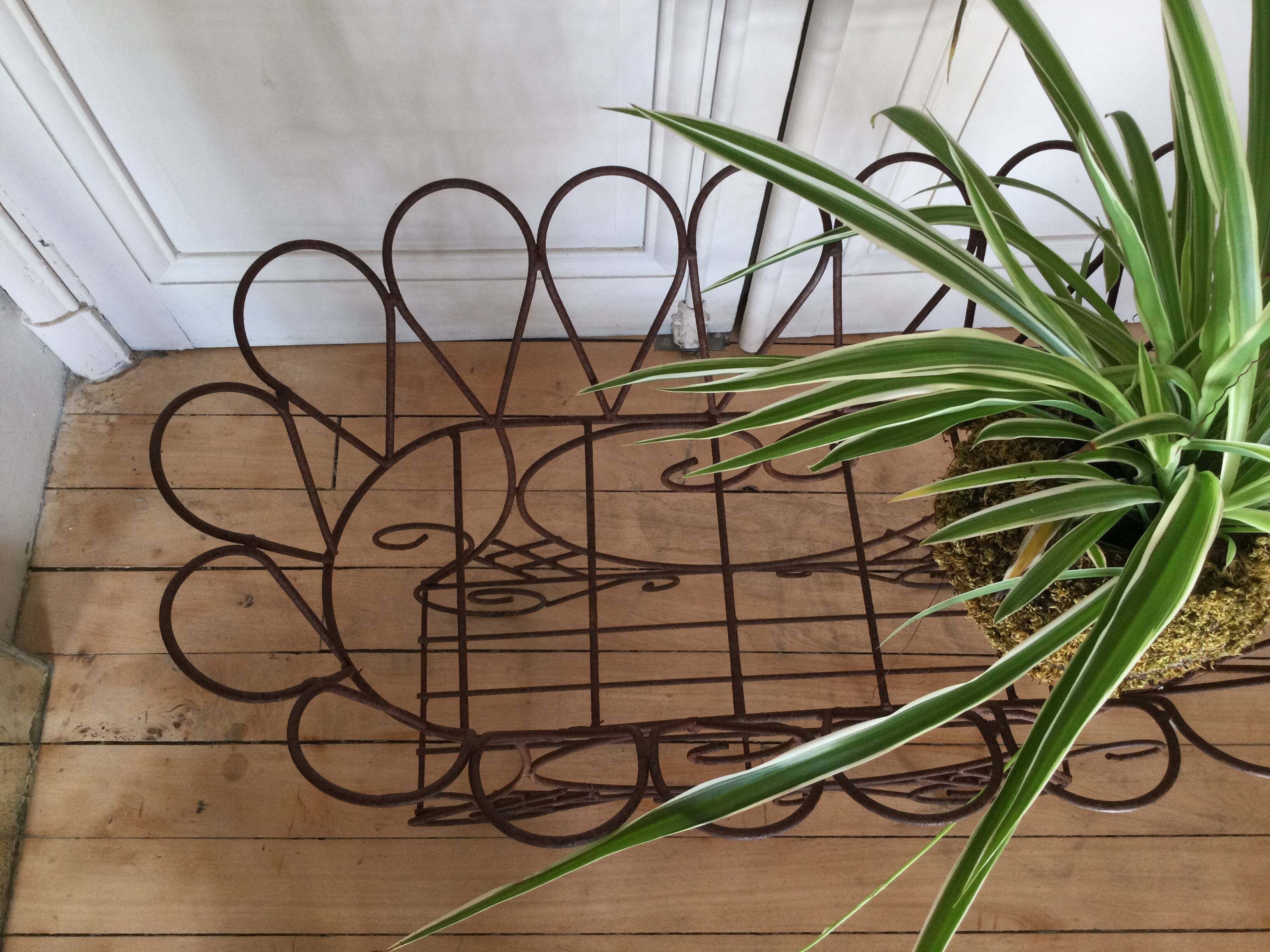 Antique iron plant stand
