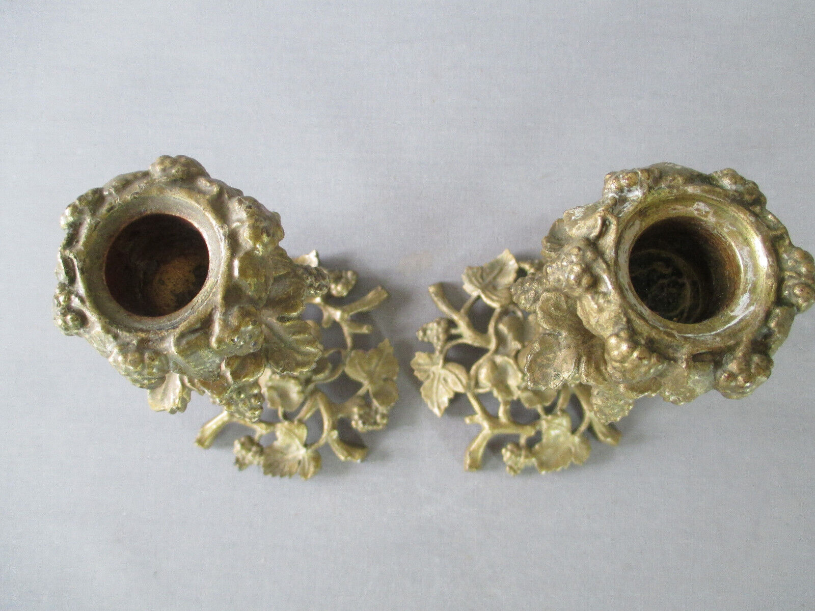 Pair of gilded bronze candlesticks with vine décor