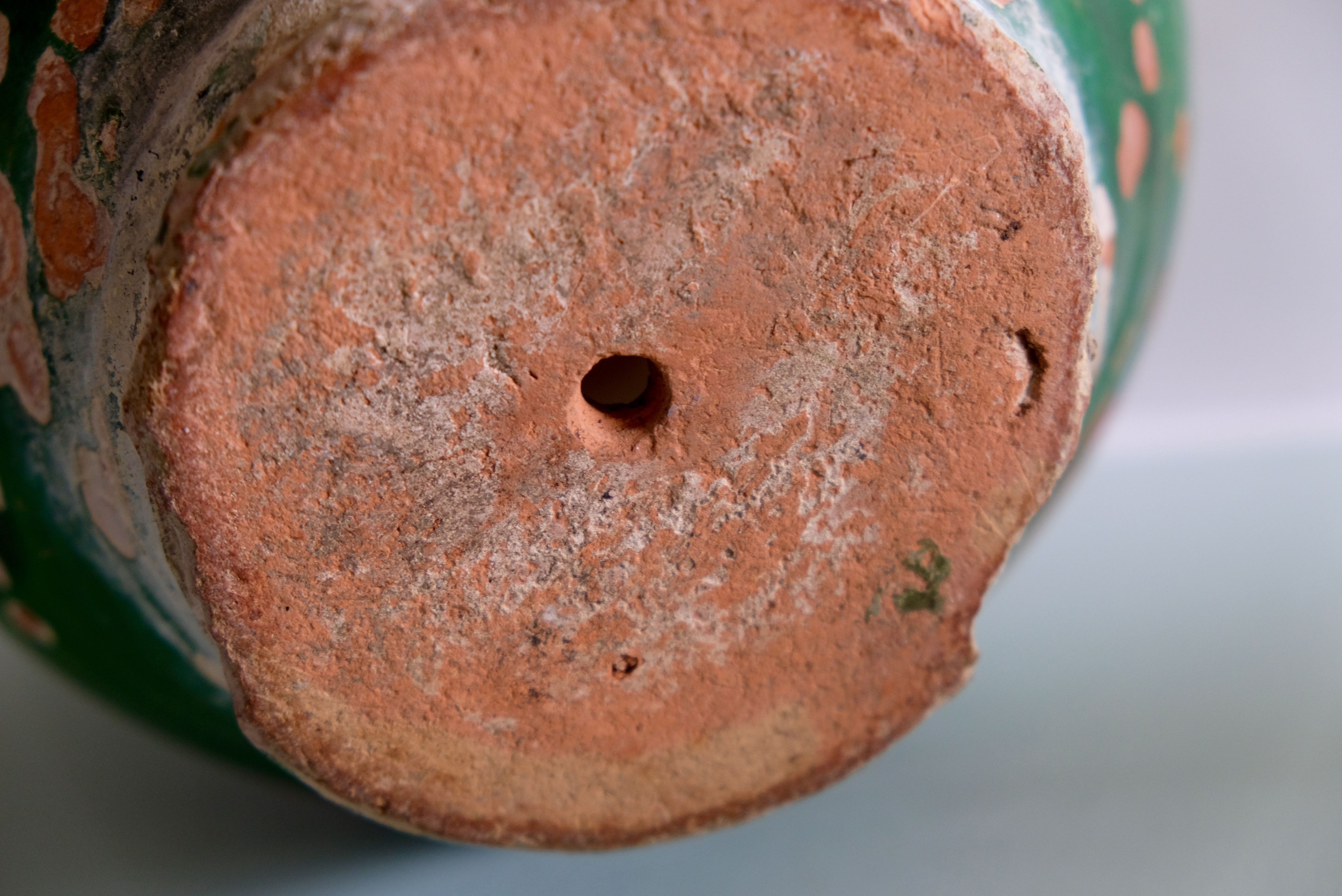 Ancient jar olive in provencal glazed terracotta, glazed green of the 19th century
